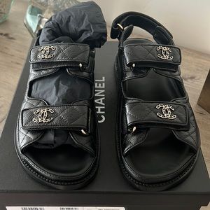 Chanel sandals.